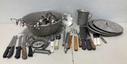 (1) Large Mixing Bowl, (14) Stainless Steel Ladles, (5) Knives, (1) Apple Core Slicer, (1) Cheese Slicer, (2) Ice Cream Scoopers, (1) Large Stainer Ladle, (4) Forks, (3) Large Frosting Spreaders, (2) Small Frosting Spreaders, +