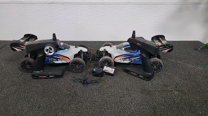 (2) Racer Model Battery Powered RC Cars with (1) Charger