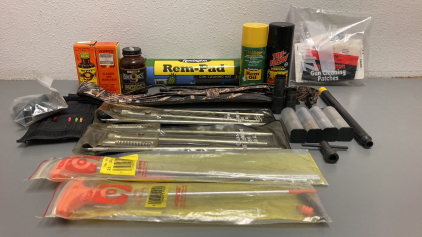 Box Of Gun Accessories And Gun Cleaning Supplies