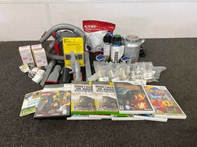 Assorted Home Goods Includes: Xbox and wii Games, light bulbs, Tape Holders and More