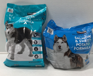 (1) 20-lb Kirkland Signature Natures Domain Dry Puppy Food (1) Partial 35-lb Kirkland Signature Natures Domain Dry Dog Food