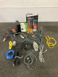 Wifi Router, XBox Hard Drive, And Assortment Of Different Cords