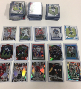 (100) Football Card Lot All in Protective Cases Loaded With Rookies and Stars