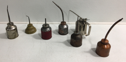 (7) Old Oil Cans