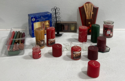 Clear Tub Full Of Candles And Candle Holders