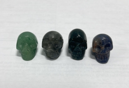 (1) Labradorite Crystal Skull 62.8ct, (1) Moss Agate Crystal Skull 77.5ct, (1) Adventurine Crystal Skull 59.15ct, (1) Sodilite Crystal Skull 58.2ct