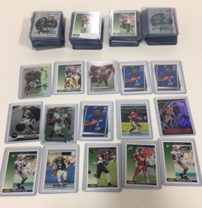 (100) Football Card Lot All in Protective Cases Loaded With Rookies and Stars