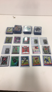 (100) Football Card Lot All in Protective Cases Loaded With Rookies and Stars