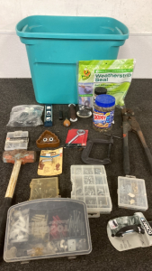 Assortment of tools and hardware
