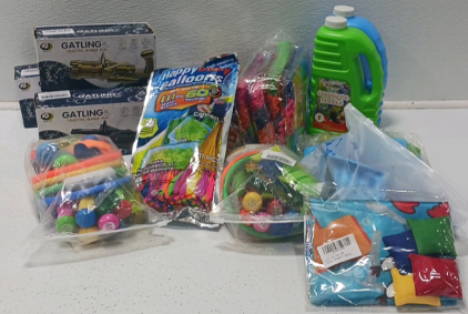 Water Balloons, Bubble Guns, Dive Toys, Slip Slide, Inflatable Ball And Bean Toss Game