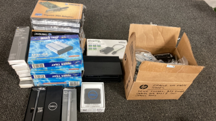 Assorted Adapters And IPad Pens