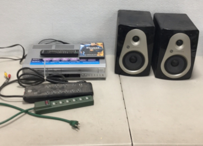 (1) Sony DVD/VCR Combo Player With Remote (2) Sterling MX5 Powered Subwoofers (2) Surge Protectors