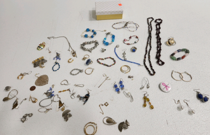Little Gold Box Full Of Costume Jewelry