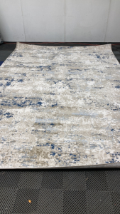 8’9” x 13’ Tan/Blue Area Rug