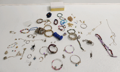 Small Box Full Of Costume Jewelry
