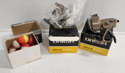 (2) Daiwa Spinning Fishing Reels, Box Of Fishing Bobbers