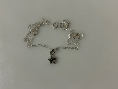 Star Shaped Pendant on Necklace