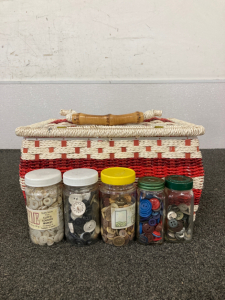 Woven Basket Filled With Sewing Supplies and Assorted Buttons