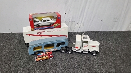 Milwaukee Tractor Trailer, Car Carrier Trailer, Ford Woody Wagon Model Car and Johny Lightning Collectable Die Cast Car in Original Box
