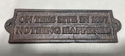 (1) Cast Iron Sign &ldquo;On This Site In 1897 Nothing Happened
