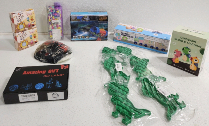 (2) Learning Machines, Pencil Bag, 3D Lamp, Dinosaur Toy,(6) Dinosaur Fidget Toys, Dinosaur Bubble Machine, Mask