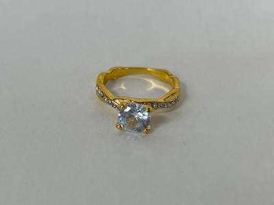 Gold Toned Ring With Clear Precious Stone Size 6