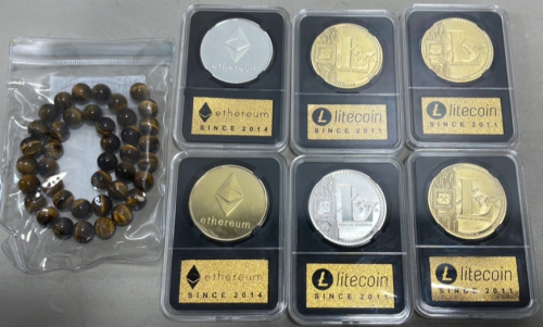 (2) Souvenir Ethereum Digital Currency Tokens, (4) Souvenir Litecoin Digital Currency Tokens, (1) Beaded Necklace