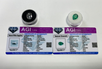 (1) Natural White Sapphire 9.90ct Gemstone, (1) Natural Columbia Emerald Both W/ COA