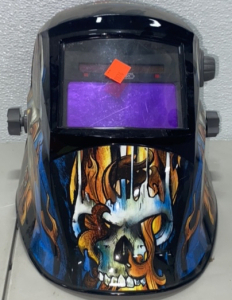 Solar Powered, Auto Darkening Welding Helmet and a Black and Decker 7”/9” Heavy Duty Angle Sander