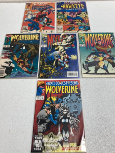 (1) X-Men in Spider-Man 1992 Comic Book in Sleeve, (1) Hawkeye 1990s Comic Book in Sleeve, (4) Wolverine 1990s Comic Books in Sleeves