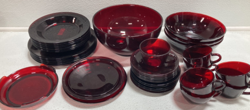 Red Glass: (1) Large Bowl, (3) Medium Bowls, (14) Plates, (12) Saucers, (7) Cups, Candle Holder, (3) Mismatched Plates