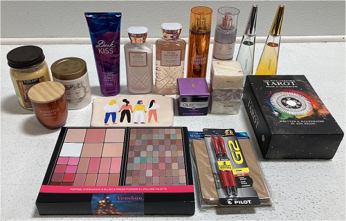 Bath and Body Works Lotion, Shower Gel and Perfume, (2) Sakamichi Perfume, (3) Candles, Tarot Deck and Guidebook, Olay Night Cream, (3) Bar Soaps, Eyeshadow Palette, Note Cards w/ Envelopes, Red Pilot Pens