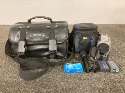 Sony Hand Held Cam Recorder, (2) Travel Bags, Mic Attachment, New DVC, and Electronic Cords