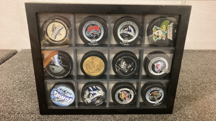 Hockey Pucks In Diaplay- (1) Signed