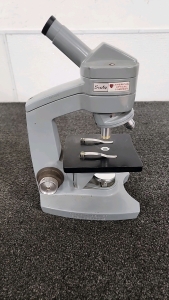 Sixty American Optical Company Microscope
