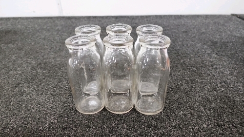 Six Vintage Glass Milk Bottles
