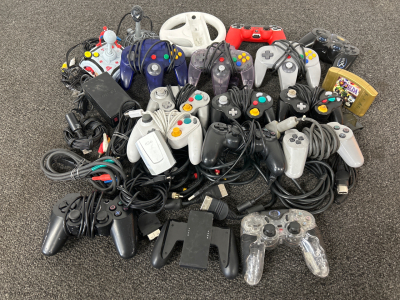 Assorted Gaming Controllers, Cables and Zelda Game