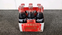 Vintage Six Pack Of Coca-Cola From Different Era's