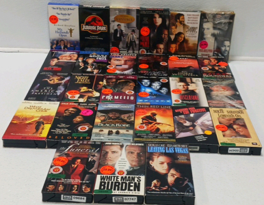 (27) Block Buster Hits On VHS Including Ledends Of The Fall, What Dreams May Come And More