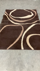 5’3” x 7’3” Brown Area Rug