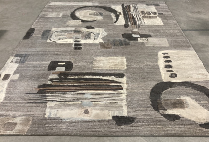 7’10” x 10’10” Gray Area Rug