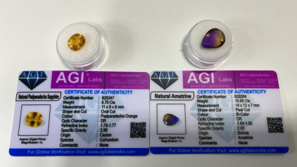 (1) Natural Padparadsha Sapphire 6.70ct, (1) Natural Ametrine 10.05ct. Both W/ COA