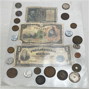 Various Coins And Bills From All Over The World