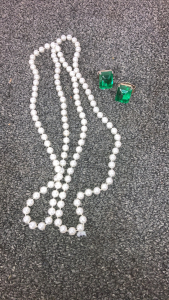 Pearl Necklaces and Green Gem Rings.