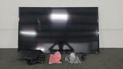 Working 49" TCL Roku TV with Legs, Wall Mount and Hardware