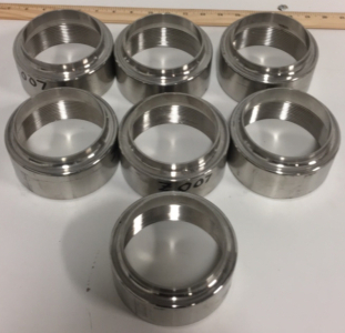 (7) Sanitary Stainless Steel 4-1/2” to 4” Adapters