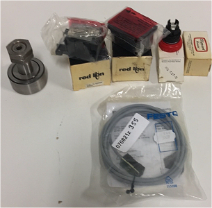 (2) Red Lion Controls Power Supplies (2) Clippard Minimatic Push Button Acuators (1) Festo Electric Proximity Switch (1) Unknown Bearing