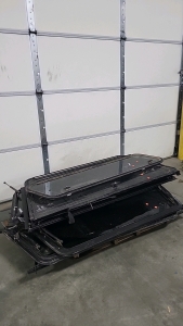 Pallet of Camper Shell Windows