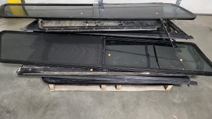 Pallet of Camper Shell Windows