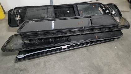 Pallet of Camper Shell Windows